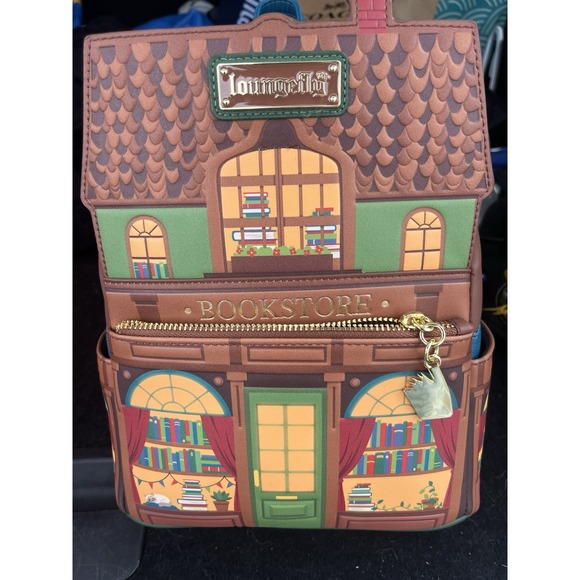Loungefly Handbags - Loungefly Bookstore GLOW-IN-THE-DARK Mini Backpack BAM Exclusive New With Tags